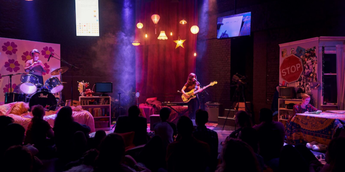 Ask Me Anything - image of Rosie Doonan playing a guitar